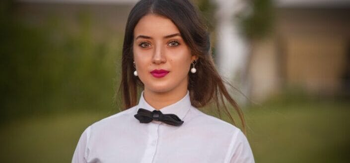 woman in waiter uniform