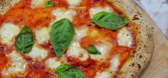 Pizza With Green Leaf on Top