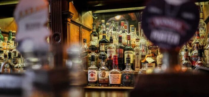Assorted Color Liquor Bottle Displayed in a Bar