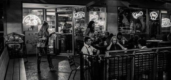 People Drinking at Outdoor Bar