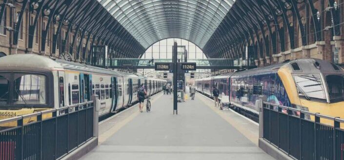People Loading and Unloading in a Train Station